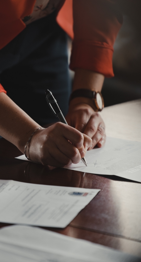 A person signing a contract